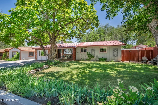 80 Strawberry Ln, Reno, NV 89509 - ranch-style house with a metal roof, a standing seam roof, board and batten siding, and a chimney