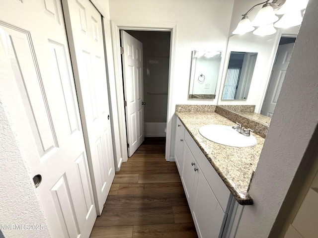 2450 Lymbery St Unit 228, Reno, NV 89509 - bathroom featuring vanity and wood finished floors
