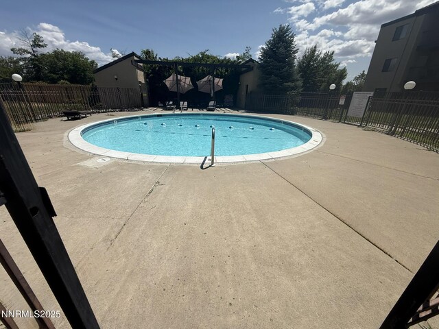 2450 Lymbery St Unit 228, Reno, NV 89509 - community pool featuring a patio