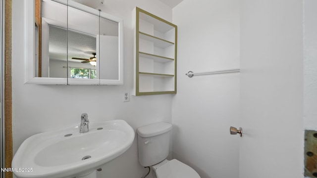 908 E Robinson St, Carson City, NV 89701 - bathroom featuring a sink and ceiling fan