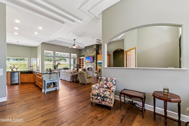 2548 Genoa Aspen Dr, Genoa, NV 89411 - living room featuring beverage cooler, recessed lighting, wood-type flooring, a ceiling fan, and arched walkways
