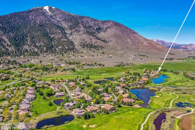 2548 Genoa Aspen Dr, Genoa, NV 89411 - aerial view of property and surrounding area featuring nearby suburban area, a water and mountain view, and a golf course