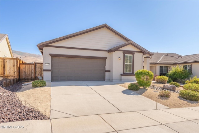1160 Sugar Creek Trl, Reno, NV 89523 - single story home with driveway, a garage, stucco siding, and a tiled roof