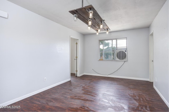 1021 Whitaker Ln, Fallon, NV 89406 - unfurnished room featuring wood finished floors and cooling unit