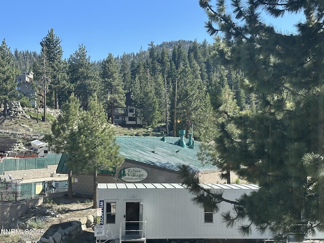 313 Tramway Dr Unit 20, Stateline, NV 89449 - view of mountain background with a heavily wooded area