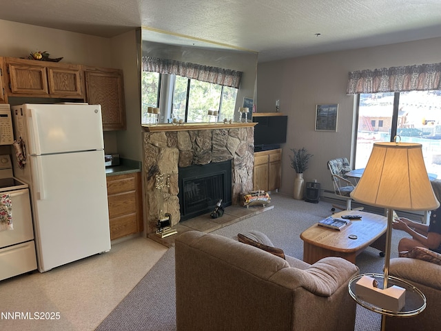 313 Tramway Dr Unit 20, Stateline, NV 89449 - living area with light colored carpet, a stone fireplace, and a textured ceiling