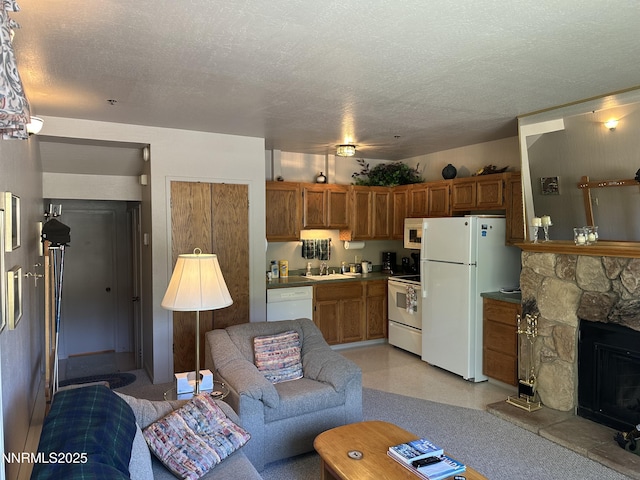 313 Tramway Dr Unit 20, Stateline, NV 89449 - living area with a stone fireplace and a textured ceiling