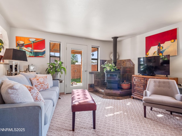 1333 Toiyabe Ave, Gardnerville, NV 89410 - carpeted living area featuring a wood stove