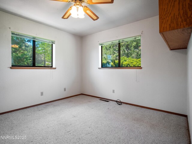 1561 Alba Vis, Gardnerville, NV 89410 - carpeted spare room featuring a ceiling fan and baseboards