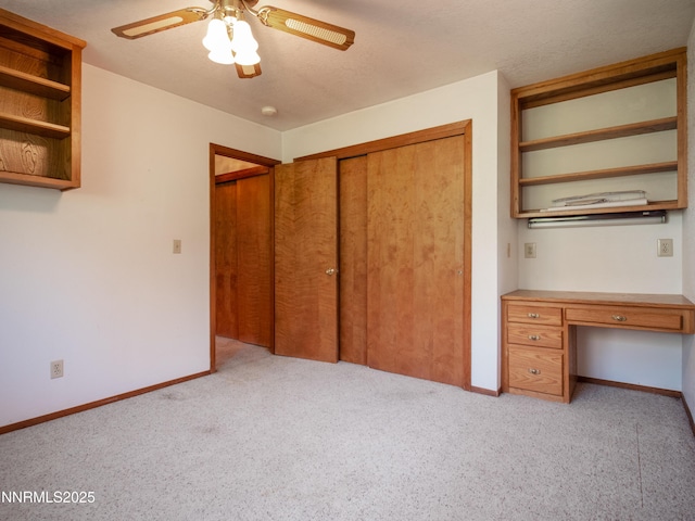 1561 Alba Vis, Gardnerville, NV 89410 - unfurnished bedroom with light carpet, a closet, ceiling fan, and a desk