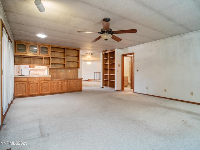 1561 Alba Vis, Gardnerville, NV 89410 - unfurnished living room featuring a ceiling fan and light carpet