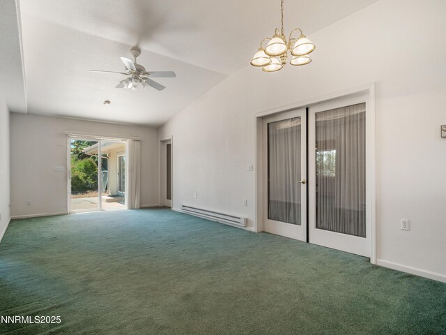 1561 Alba Vis, Gardnerville, NV 89410 - carpeted spare room featuring a baseboard radiator, vaulted ceiling, a chandelier, a ceiling fan, and french doors