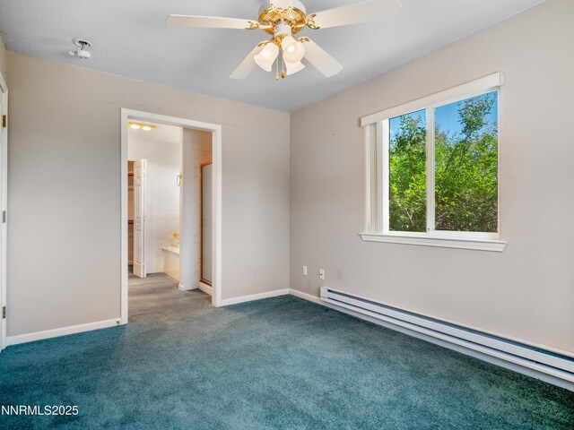 1561 Alba Vis, Gardnerville, NV 89410 - unfurnished bedroom featuring a baseboard heating unit, carpet floors, and ceiling fan