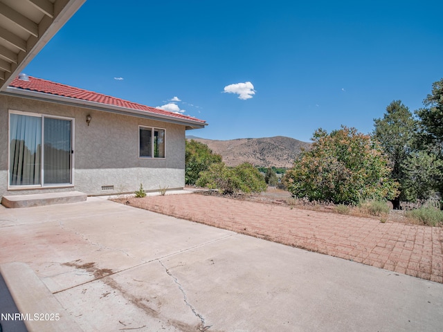 1561 Alba Vis, Gardnerville, NV 89410 - view of patio featuring a mountain view