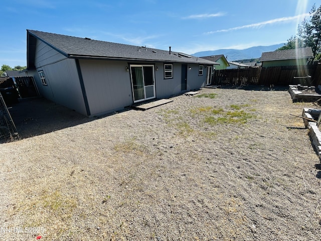 1442 Spooner Dr, Carson City, NV 89706 - rear view of house featuring a mountain view