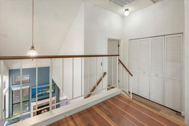 4318 Leeward Ln, Reno, NV 89502 - corridor featuring wood finished floors and an upstairs landing