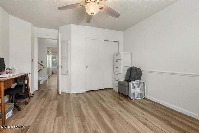 4318 Leeward Ln, Reno, NV 89502 - unfurnished office featuring light wood finished floors, a textured ceiling, and ceiling fan