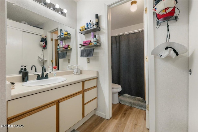 4318 Leeward Ln, Reno, NV 89502 - bathroom with wood finished floors and vanity