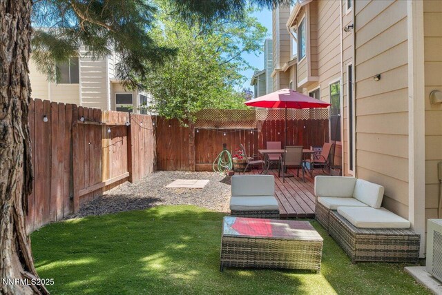 4318 Leeward Ln, Reno, NV 89502 - fenced backyard featuring outdoor dining space and an outdoor living space