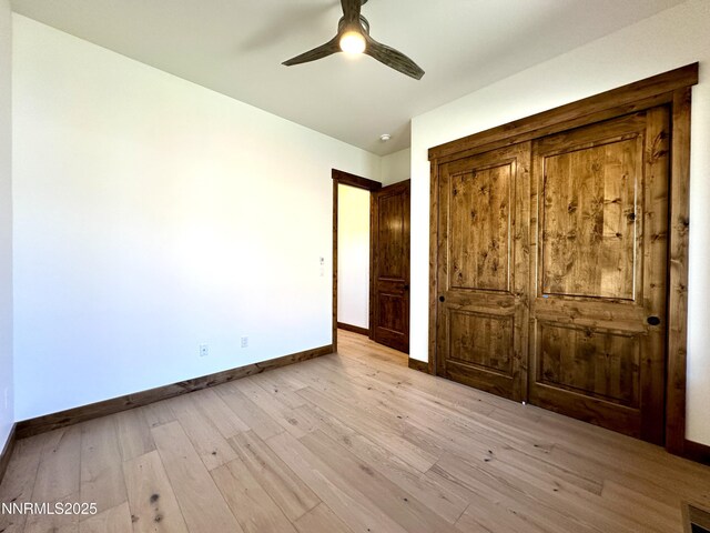 2935 Portrush Dr, Genoa, NV 89411 - unfurnished bedroom with light wood-style flooring and ceiling fan