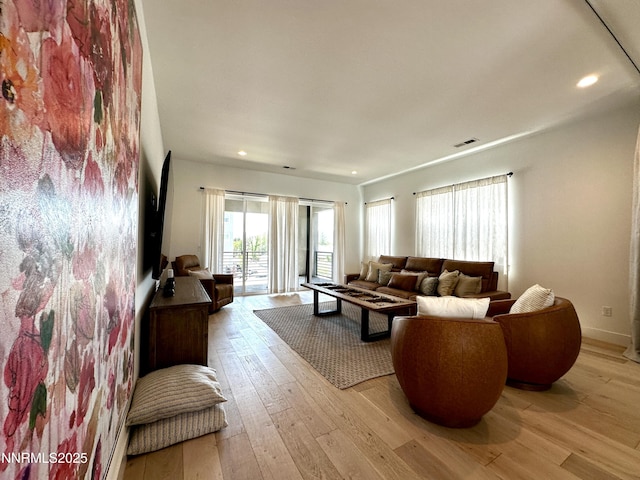 5454 Side Saddle Trl, Reno, NV 89511 - living room with light wood-style floors and recessed lighting