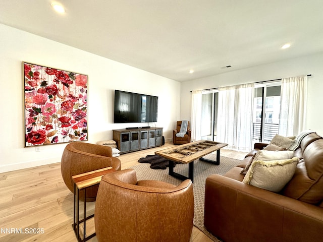 5454 Side Saddle Trl, Reno, NV 89511 - living area featuring light wood finished floors and recessed lighting