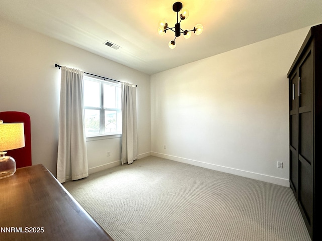 5454 Side Saddle Trl, Reno, NV 89511 - unfurnished bedroom with a chandelier and light colored carpet