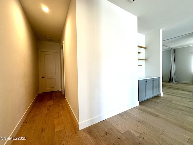 5454 Side Saddle Trl, Reno, NV 89511 - hallway featuring light wood-type flooring and baseboards