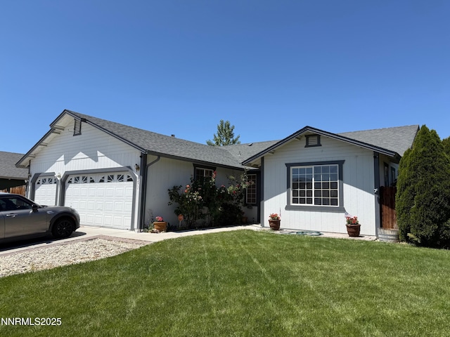 2271 Ruddy Way, Spanish Springs, NV 89441 - ranch-style home with a garage, a front yard, and roof with shingles