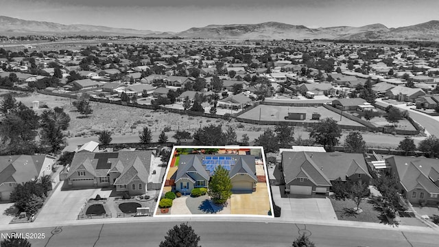 164 Oakridge Dr, Dayton, NV 89403 - aerial view of residential area with property parcel outlined and a mountain backdrop