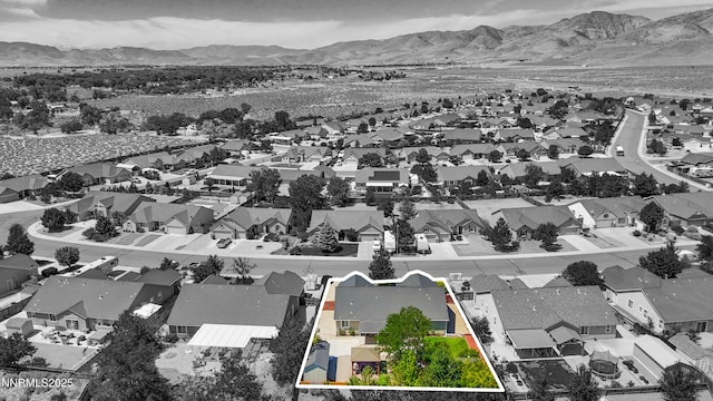 164 Oakridge Dr, Dayton, NV 89403 - aerial perspective of suburban area featuring a mountainous background and property boundaries highlighted