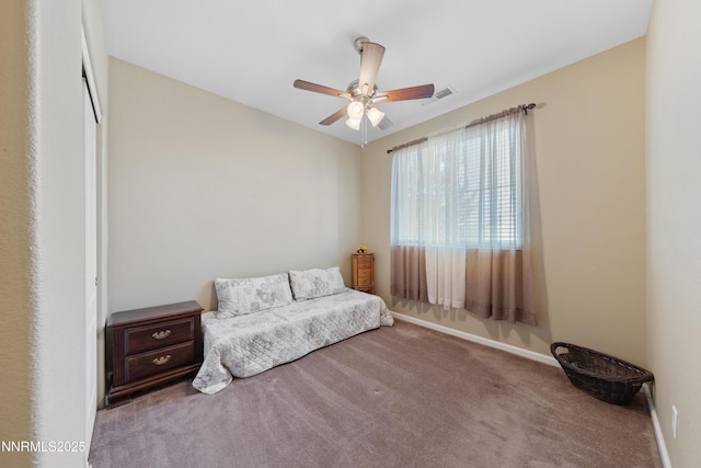 164 Oakridge Dr, Dayton, NV 89403 - carpeted bedroom with baseboards and ceiling fan