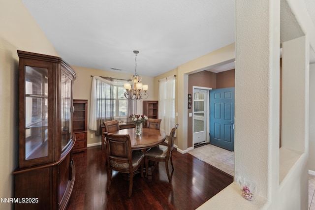 164 Oakridge Dr, Dayton, NV 89403 - dining room featuring a chandelier and wood finished floors