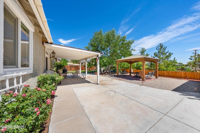 164 Oakridge Dr, Dayton, NV 89403 - fenced backyard with a gazebo and a patio