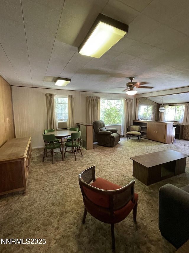 4 3rd St, Mcgill, NV 89318 - carpeted living area featuring ceiling fan and wooden walls