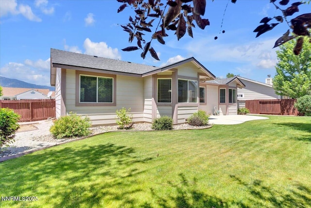 1797 Lantana Dr, Minden, NV 89423 - rear view of house with a patio area and roof with shingles