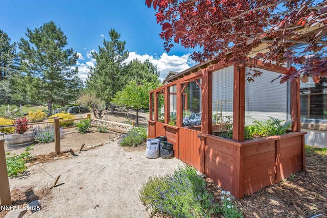 186 Carleton Ct, Reno, NV 89511 - view of home's exterior with a garden