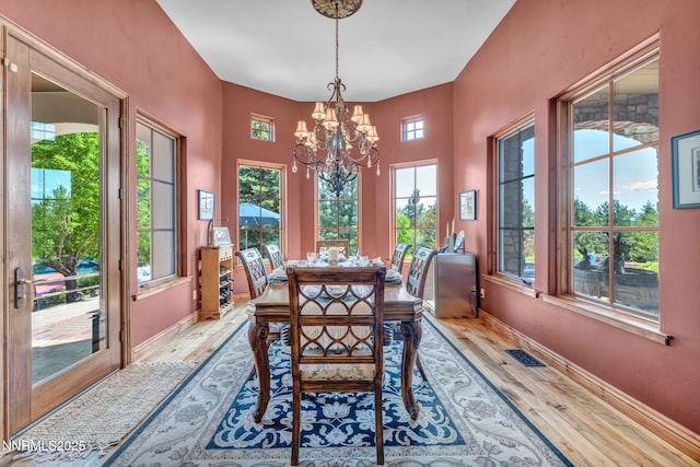 186 Carleton Ct, Reno, NV 89511 - dining area featuring wood finished floors and a chandelier