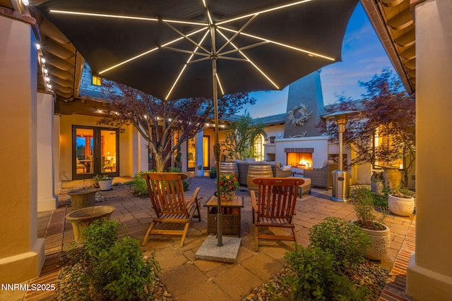 186 Carleton Ct, Reno, NV 89511 - view of patio / terrace featuring an outdoor living space with a fireplace