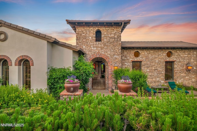 186 Carleton Ct, Reno, NV 89511 - view of front of home with stucco siding and stone siding