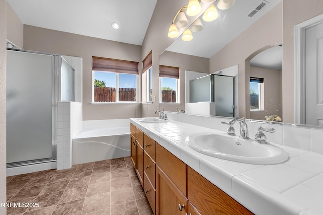 5287 Vidette Meadows Dr, Sparks, NV 89436 - bathroom featuring a shower stall, double vanity, and a garden tub