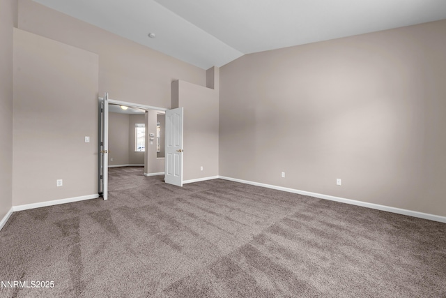 5287 Vidette Meadows Dr, Sparks, NV 89436 - unfurnished room with vaulted ceiling and carpet floors