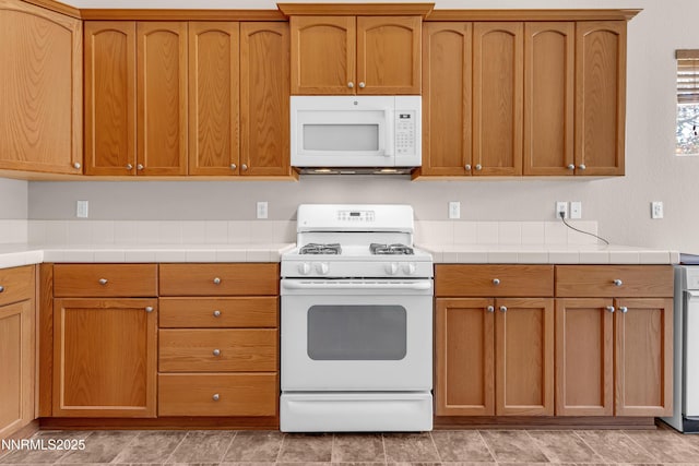 5287 Vidette Meadows Dr, Sparks, NV 89436 - kitchen featuring white appliances and brown cabinets