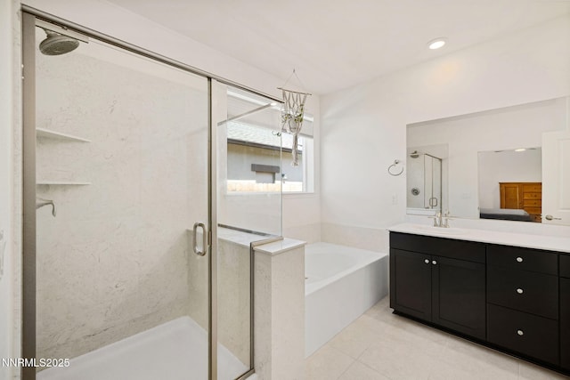 1149 Dapple Dr, Minden, NV 89423 - full bath with a garden tub, a shower stall, vanity, and tile patterned floors