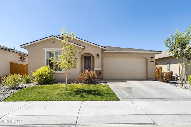 1149 Dapple Dr, Minden, NV 89423 - view of front of home featuring an attached garage, concrete driveway, and stucco siding