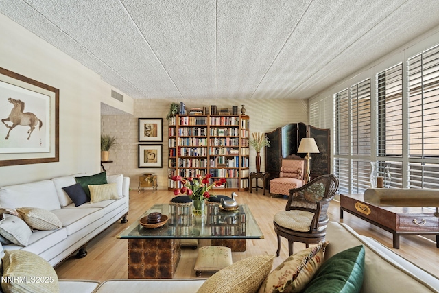 1200 Riverside Dr # 1232, Reno, NV 89503 - living area featuring wood finished floors and a textured ceiling