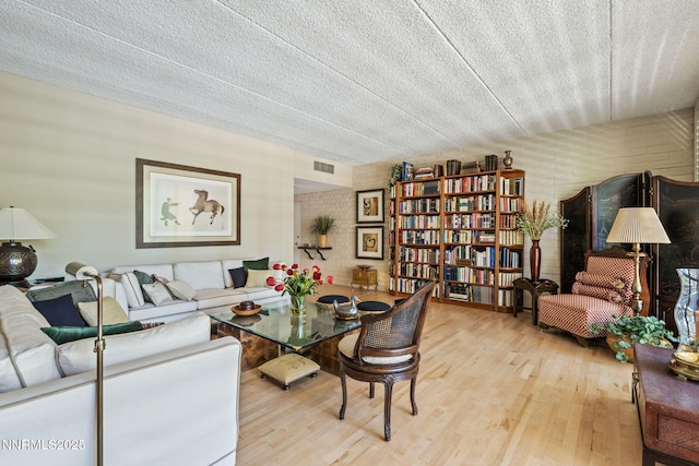 1200 Riverside Dr # 1232, Reno, NV 89503 - living area with wood finished floors and a textured ceiling