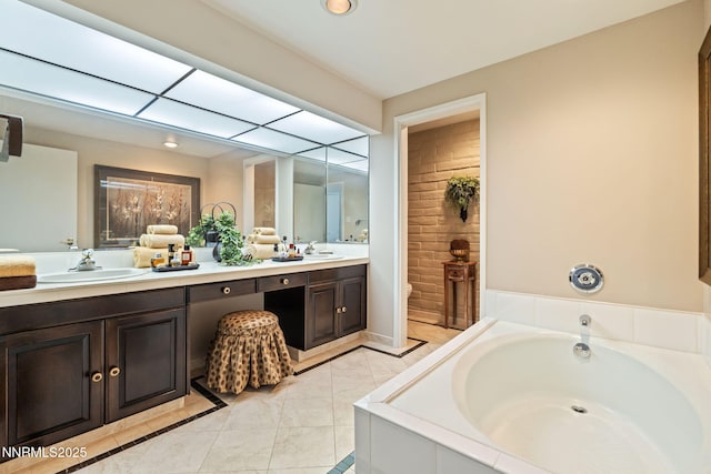 1200 Riverside Dr # 1232, Reno, NV 89503 - bathroom with double vanity, a garden tub, tile patterned flooring, and recessed lighting