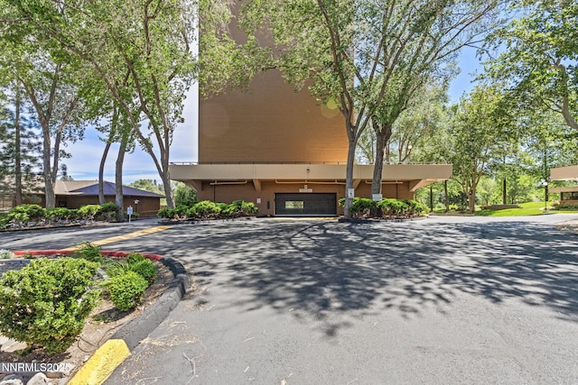 1200 Riverside Dr # 1232, Reno, NV 89503 - view of property featuring a garage and uncovered parking