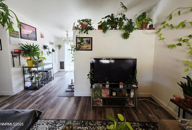 5776 Sculptor Ct, Sun Valley, NV 89433 - living room featuring a chandelier and wood finished floors
